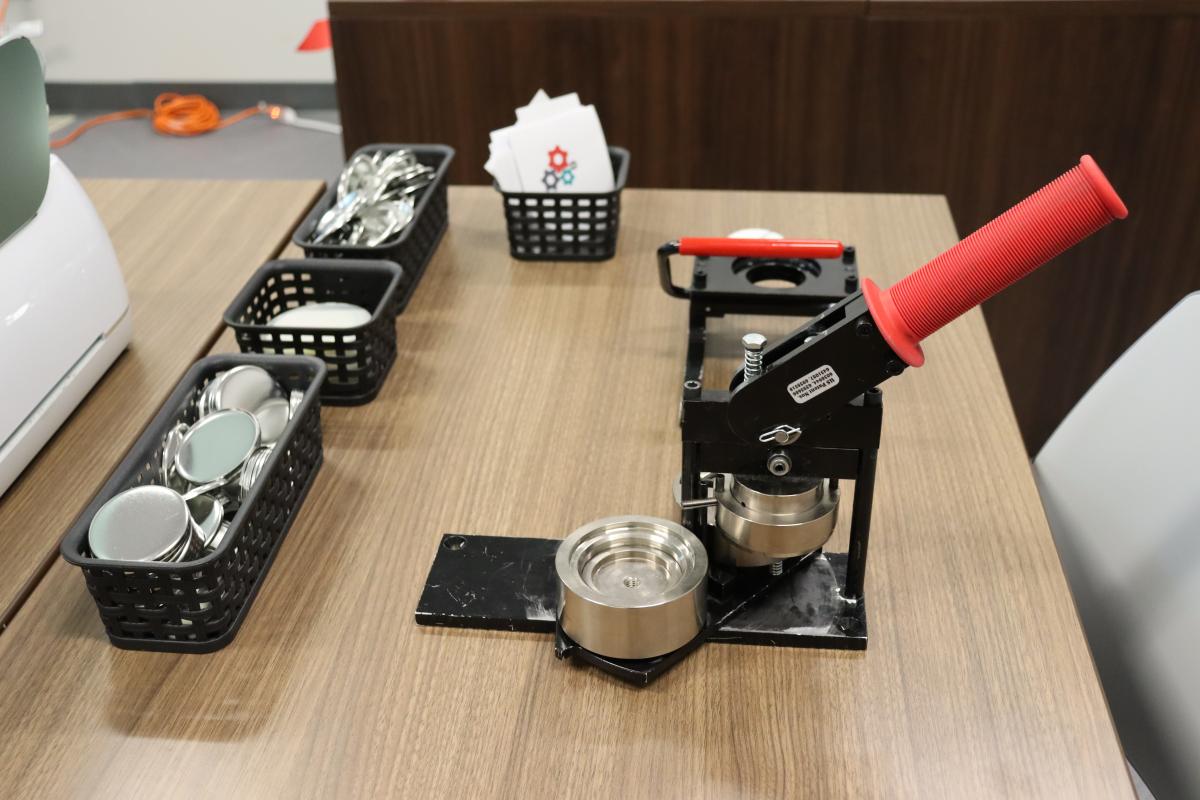 Button Maker on table